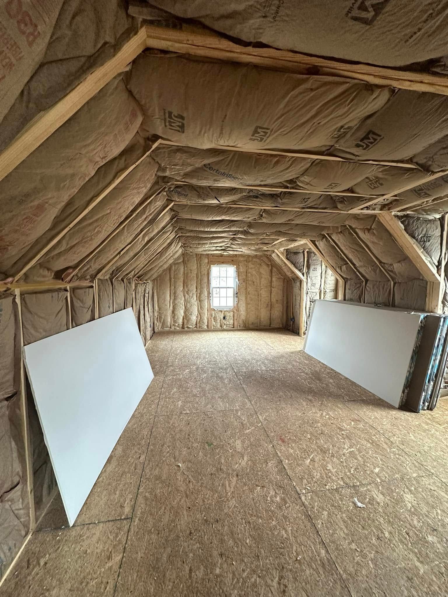 Insulated attic prepared for professional drywall installation