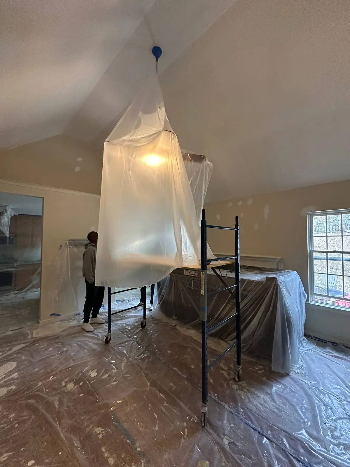 Protected room prepared for ceiling texture removal
