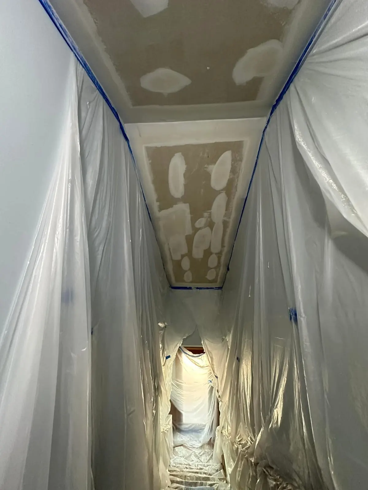 Popcorn ceiling removal project in a local home