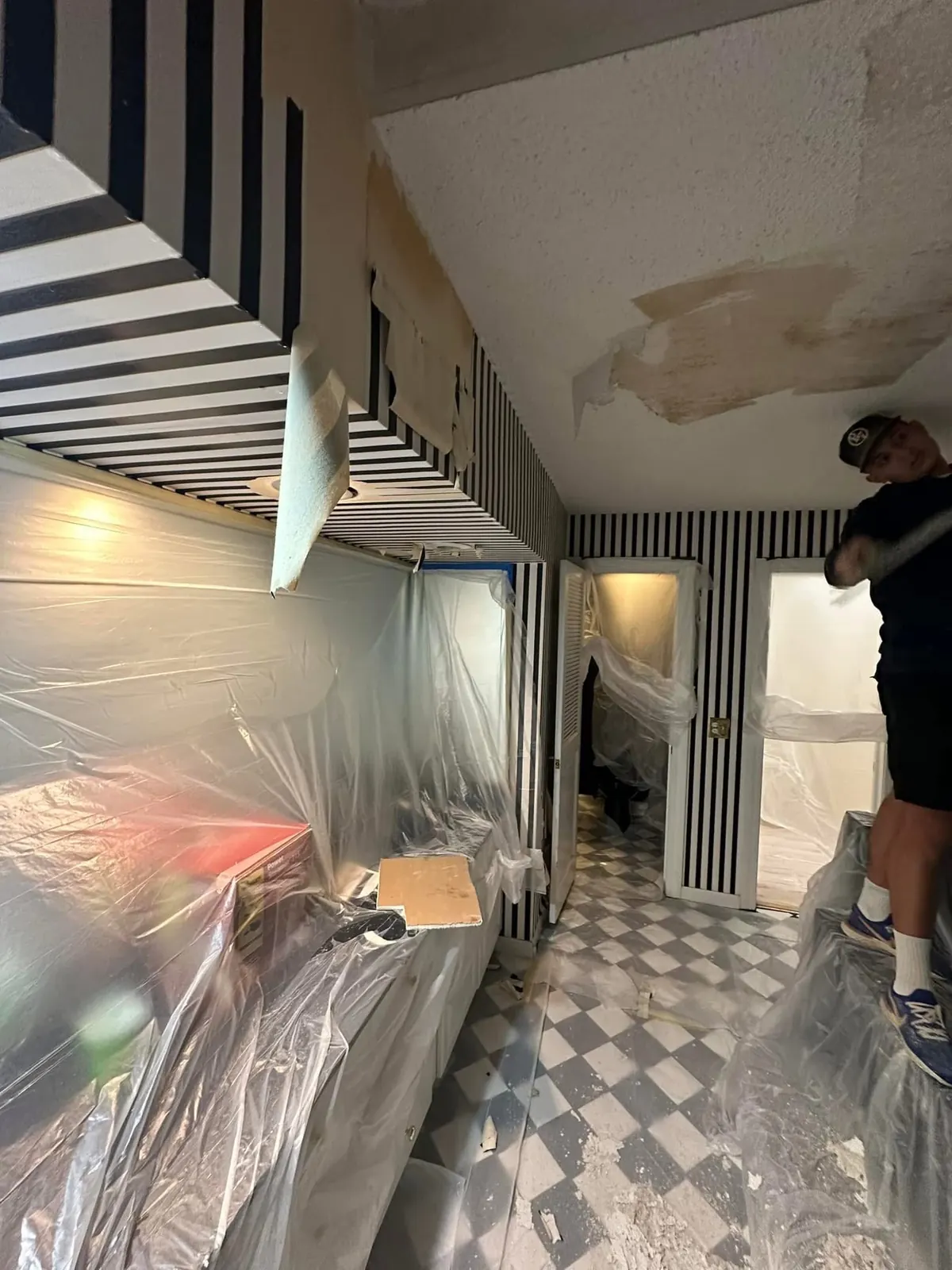Ceiling texture removal and finishing in progress