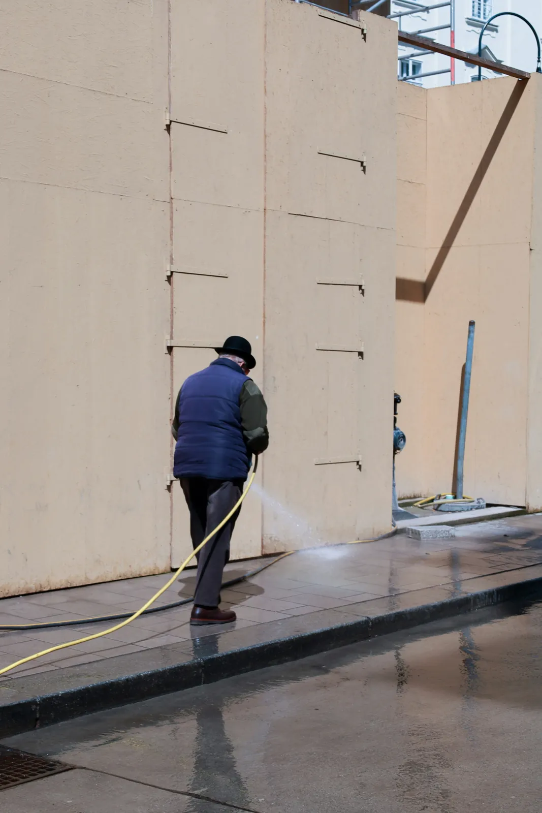 Cleaning an exterior wall with water